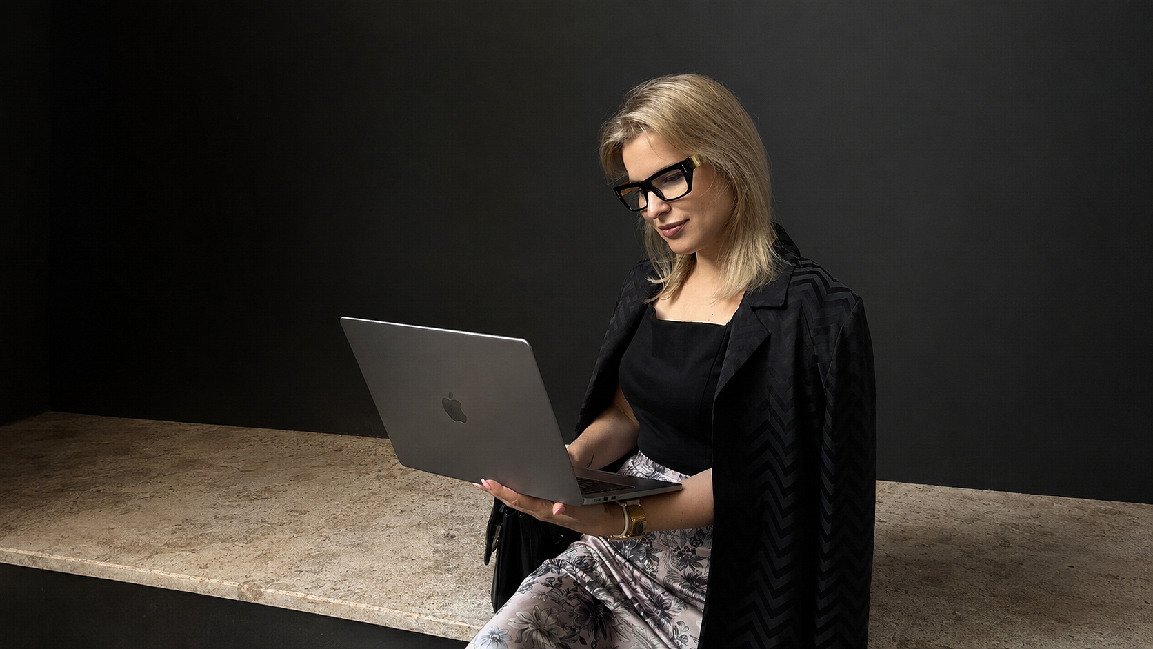Matchmaker reviewing a candidate application on a laptop — the Velin Introduction Protocol