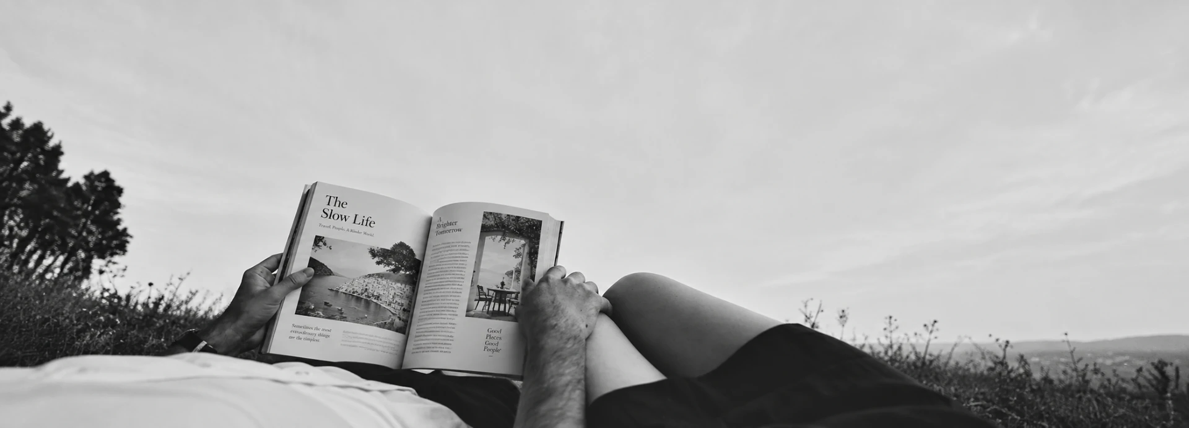 Couple reading together in black and white